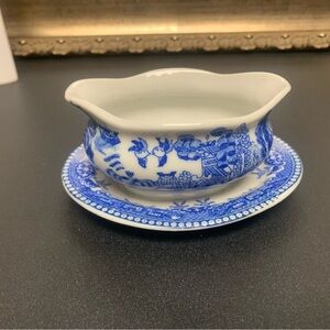 This is a miniature Blue Willow toy gravy boat